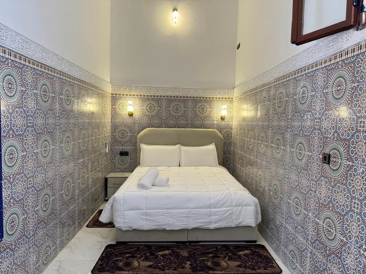 La chambre familiale, le grand lit